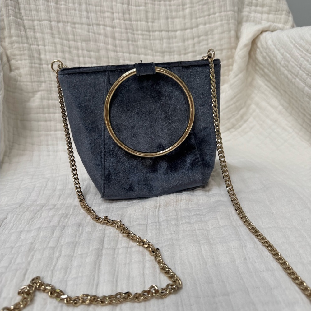 Elegant Navy Blue Velvet Bag with Gold Ring
